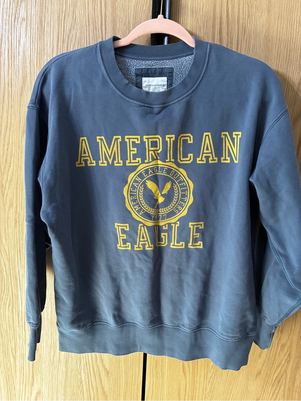American Eagle Outfitters Navy Blue Crewneck Sweatshirt with Yellow Logo